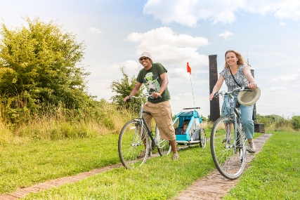 People cycling in Telford Town Park